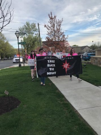 Women in AAUW and the outer college community marching to spread awareness of sexual violence.
Photos By: AAUW and Alyssa Flannery