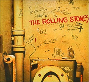 The cover of the album "Beggars Banquet" by the Rolling Stones.