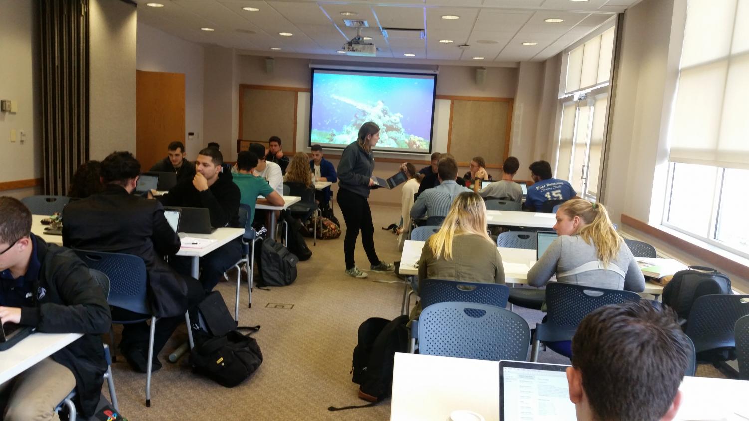 Students from a first-year writing seminar and the digital rhetorics class working in the United, Brethrens, & Church Rooms during the National Week on Writing. Credit: Gabrielle Stanley