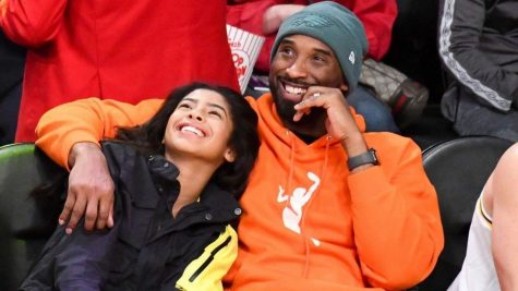Kobe Bryant and daughter Gianna enjoying a basketball game