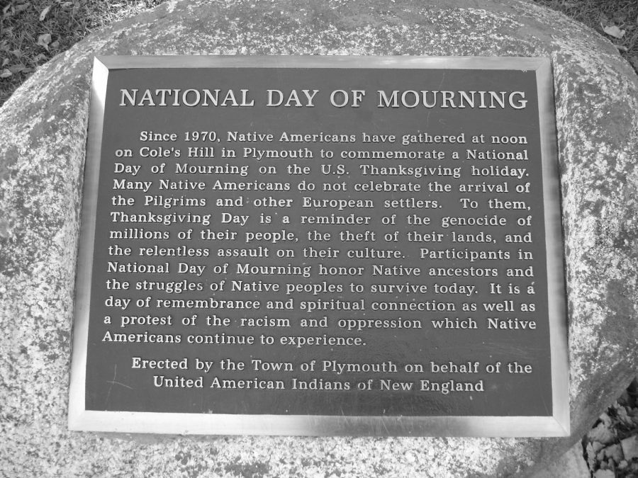 The plaque located in Plymouth that acknowledges the difficult relationship between indigenous people and Thanksgiving; Photo Courtesy of: capeandislands.org