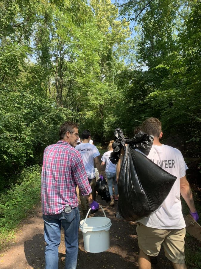 Picking up trash along the Monocacy Creek. 