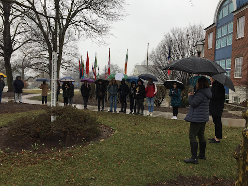 At noon on March 9th, the Moravian community gathered around the Peace Pole on North Campus to "Stand for Peace," in a show of solidarity with the people of Ukraine. Photo courtesy of Staff