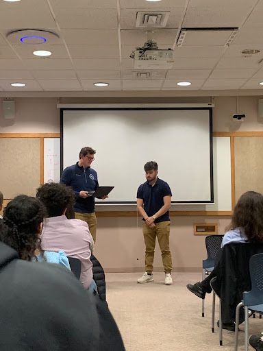Michael Irving ‘24, incoming USG President, takes the USG Oath of Office from departing President Kyle Strubeck ‘23. 

Photo Courtesy of Liz Kameen
