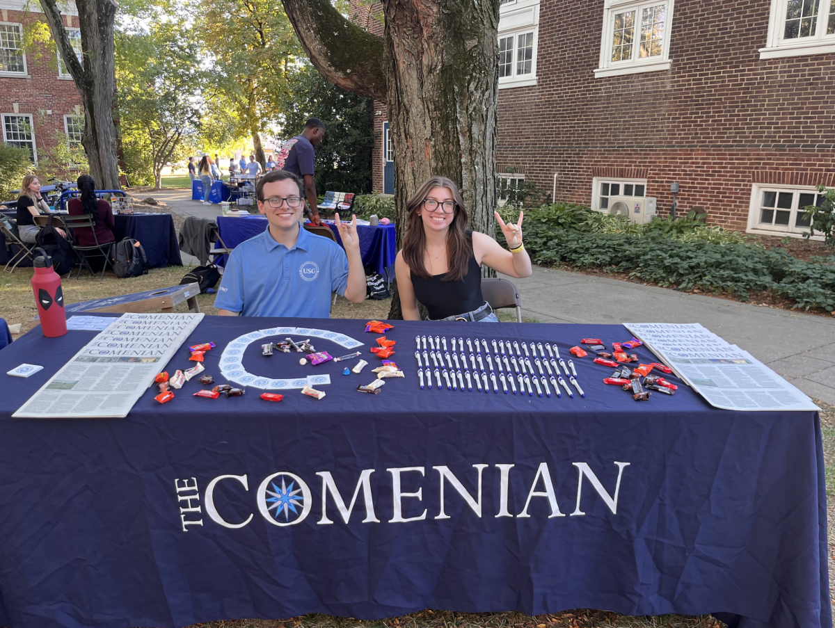 Photo by Logan Palau '25. The Comenian Newspaper club table. From left to right: AJ Minnich '25, Lola Offenback '26. 