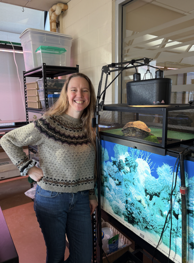 Pictured: Dr. Sara McClelland and Suzy Waffles, the turtle. Photo by Rose Diekmann.