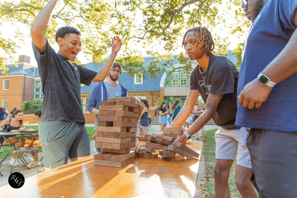 First year students playing a large-scale version of Jenga. 