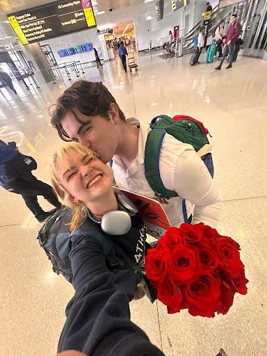Liz and her boyfriend in the airport. Photo by Liz Kameen. 