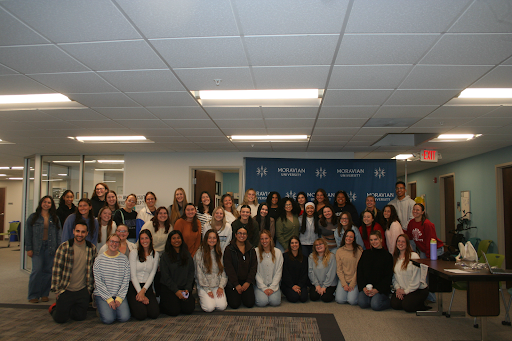 Photo from Fatimah Bouri. Pictured: SLP students gathered for a group photo
