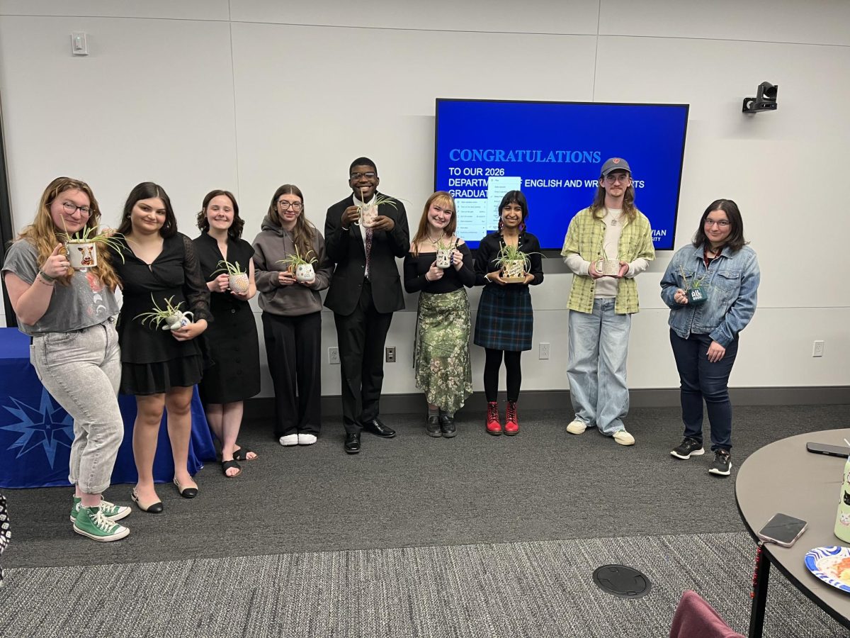 Photo from Mark Harris. Pictured: English major seniors at their send-off event. 